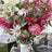 Bouquet of pink and white flowers with a blurred background