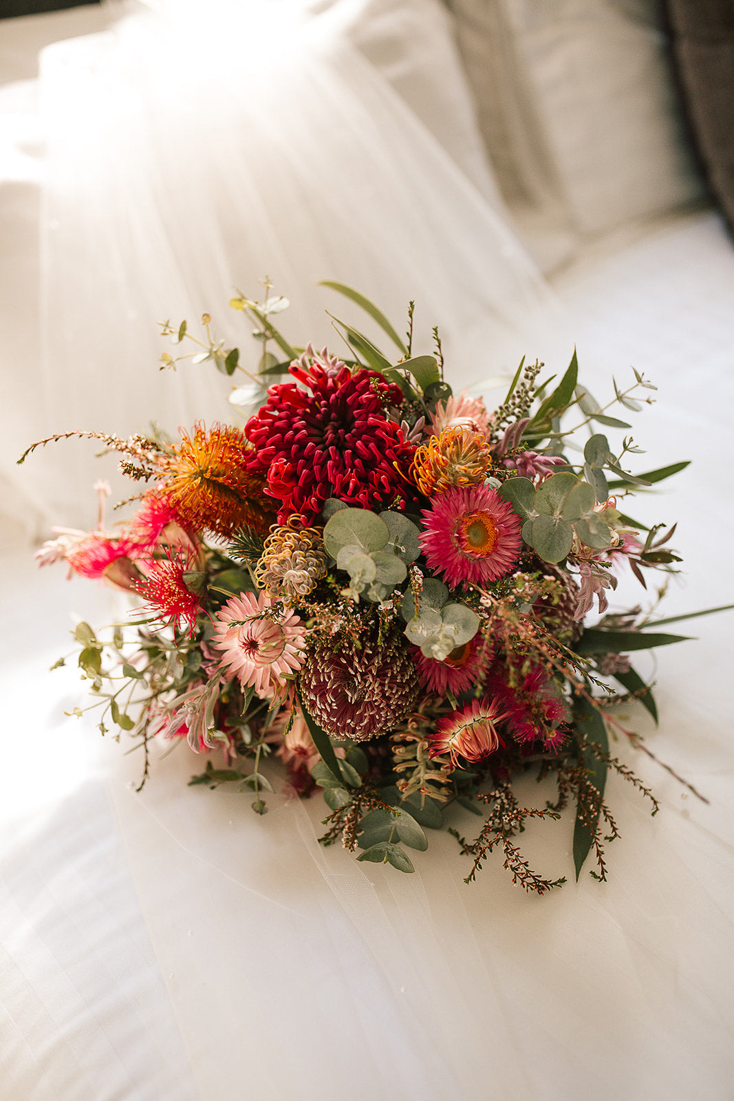 Australian native wedding bouquet on a white surface
