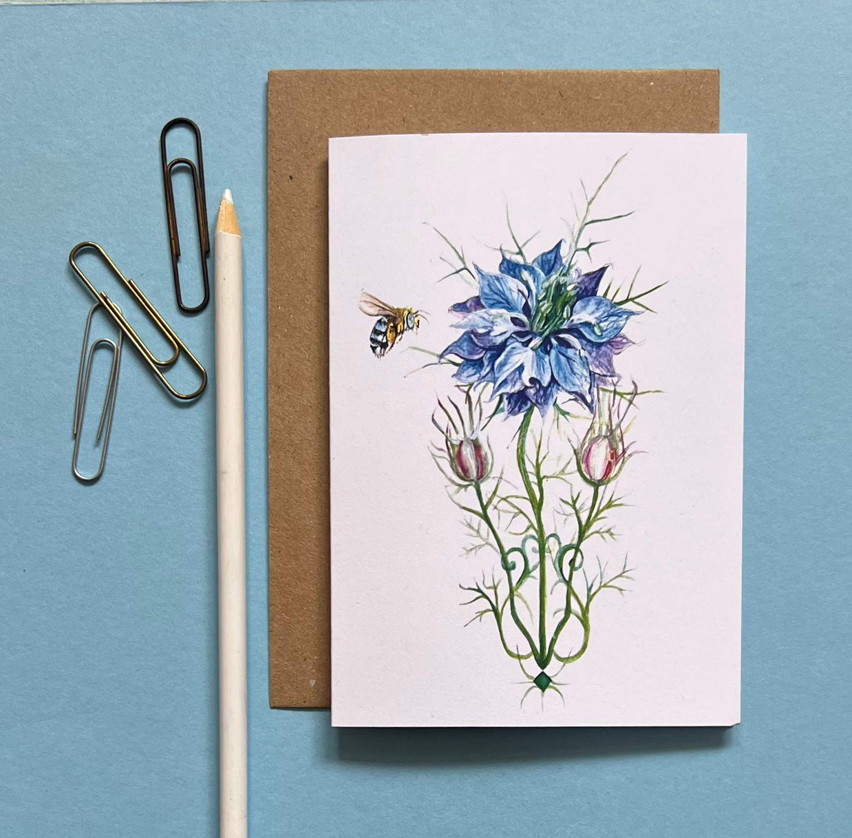 'The Nigella with her little blue bee' card by artist Anthea Ben Naim