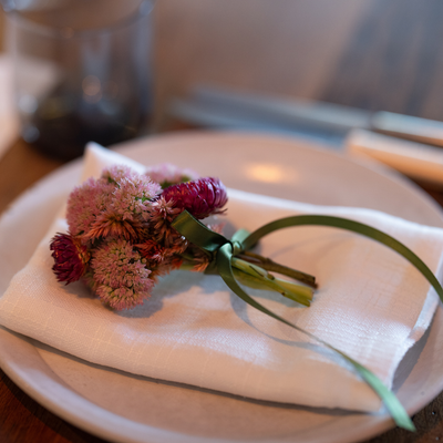 Small bouquet of flowers on a white plate